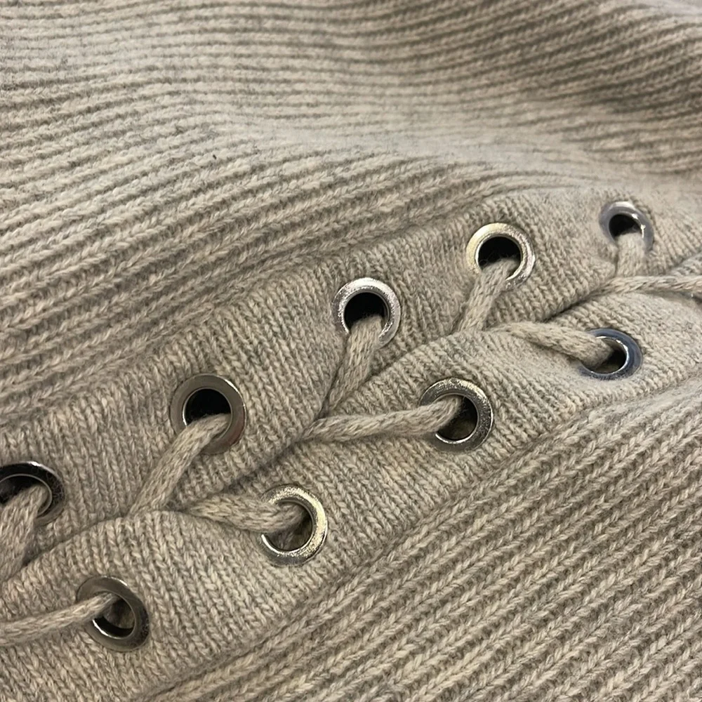 Gray crewneck sweater with lace up detail